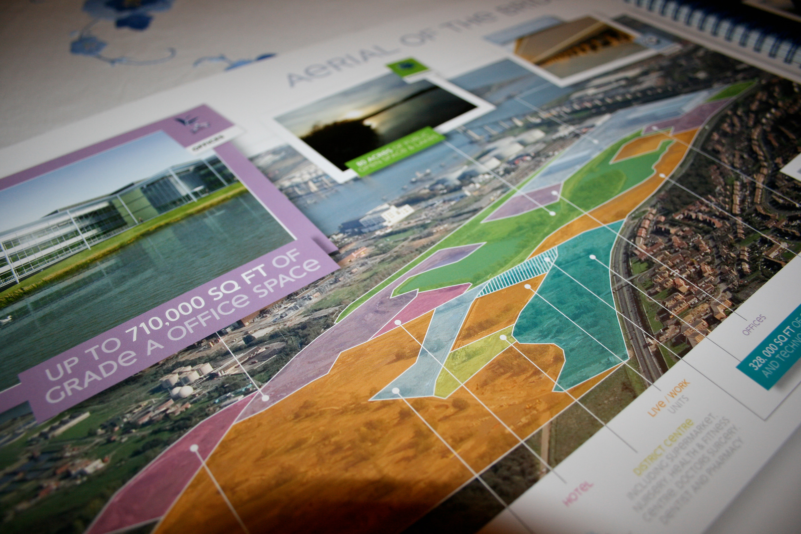 A highlighted graphic over an aerial shot of an industrial property development. 