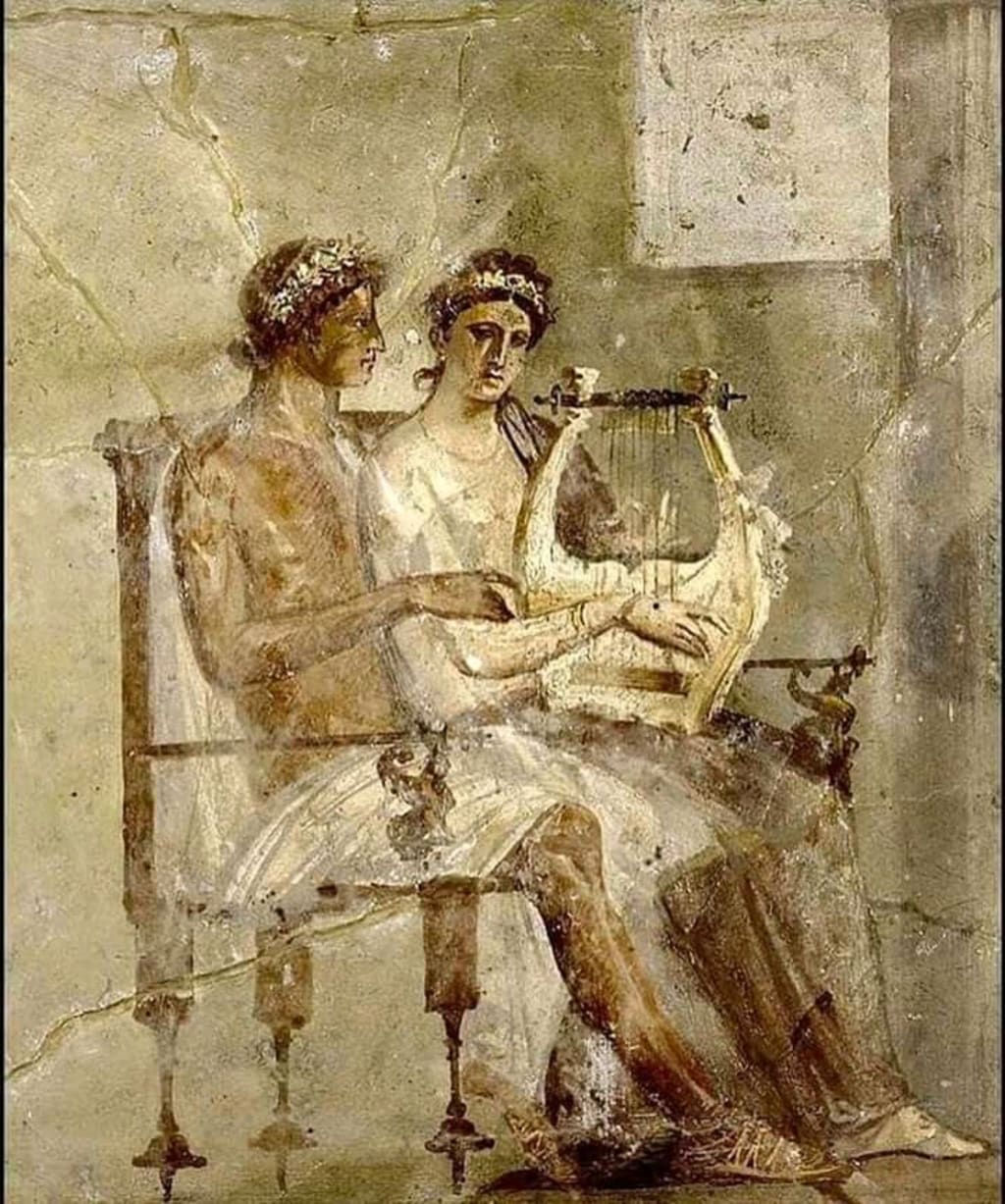 Fresco from Pompeii (c. 50-75 CE), showing a man teaching his partner how to play the Lyre.