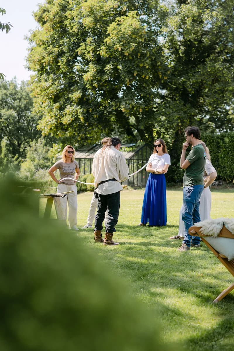 Participants in an immersive team-building event at Les Templiers in Wavre.