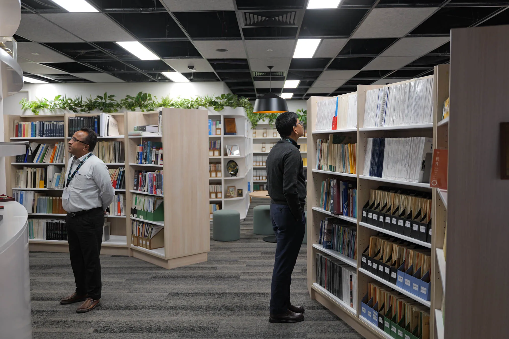 People walking around the National Transport Research Information Service Library.