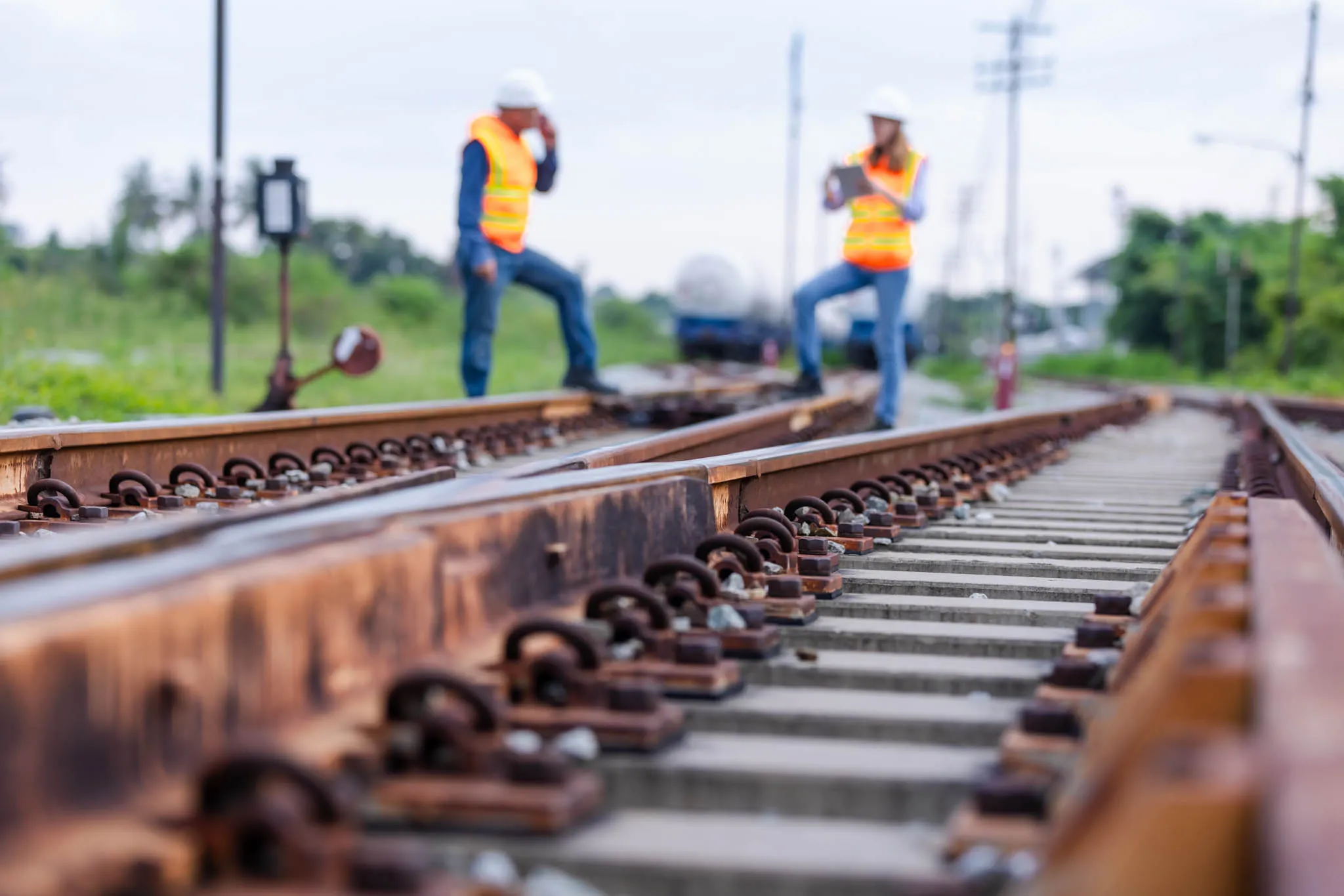 Workers analysing a railway.