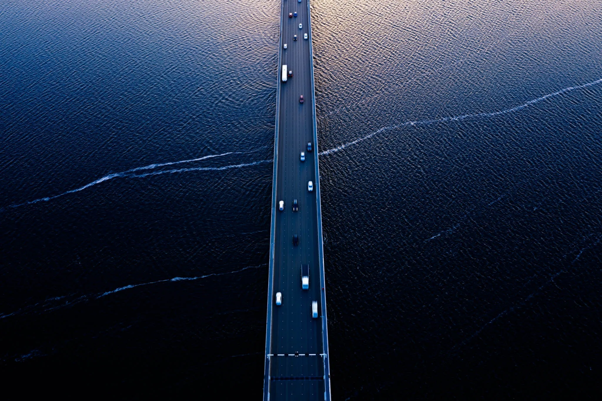 Cars driving over the Tasman bridge in Australia.