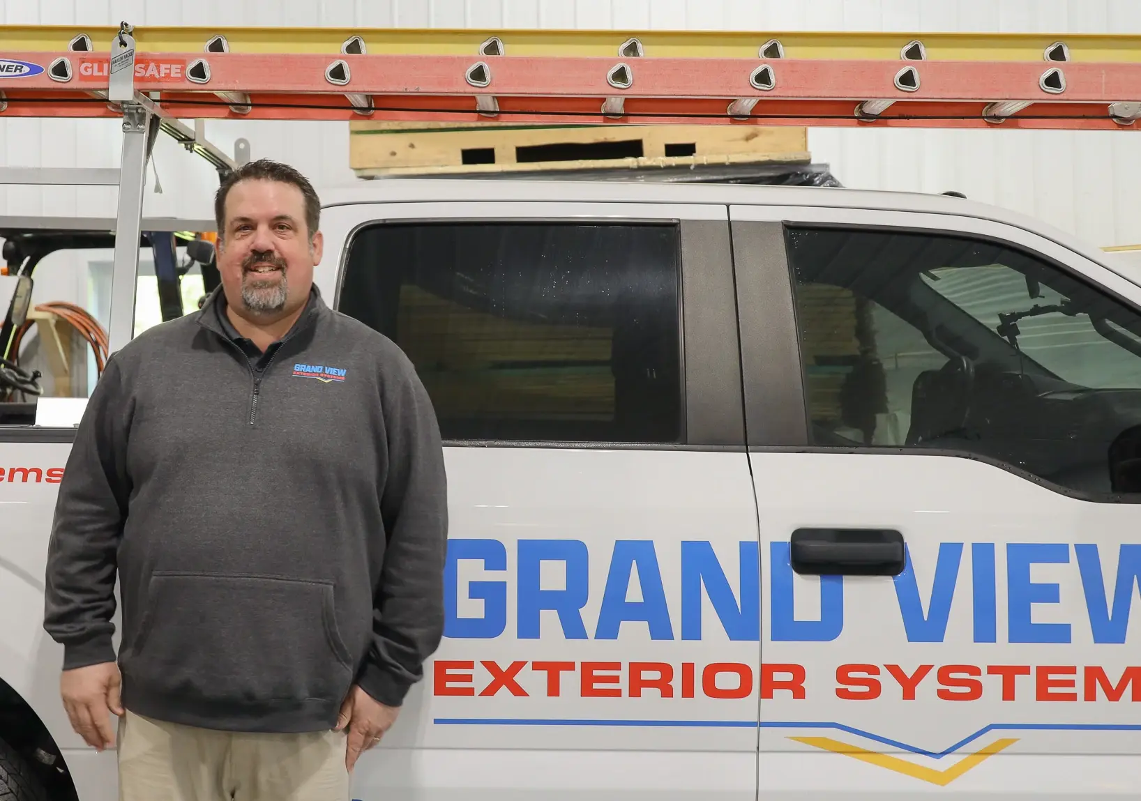 chris mullens headshot in front of truck