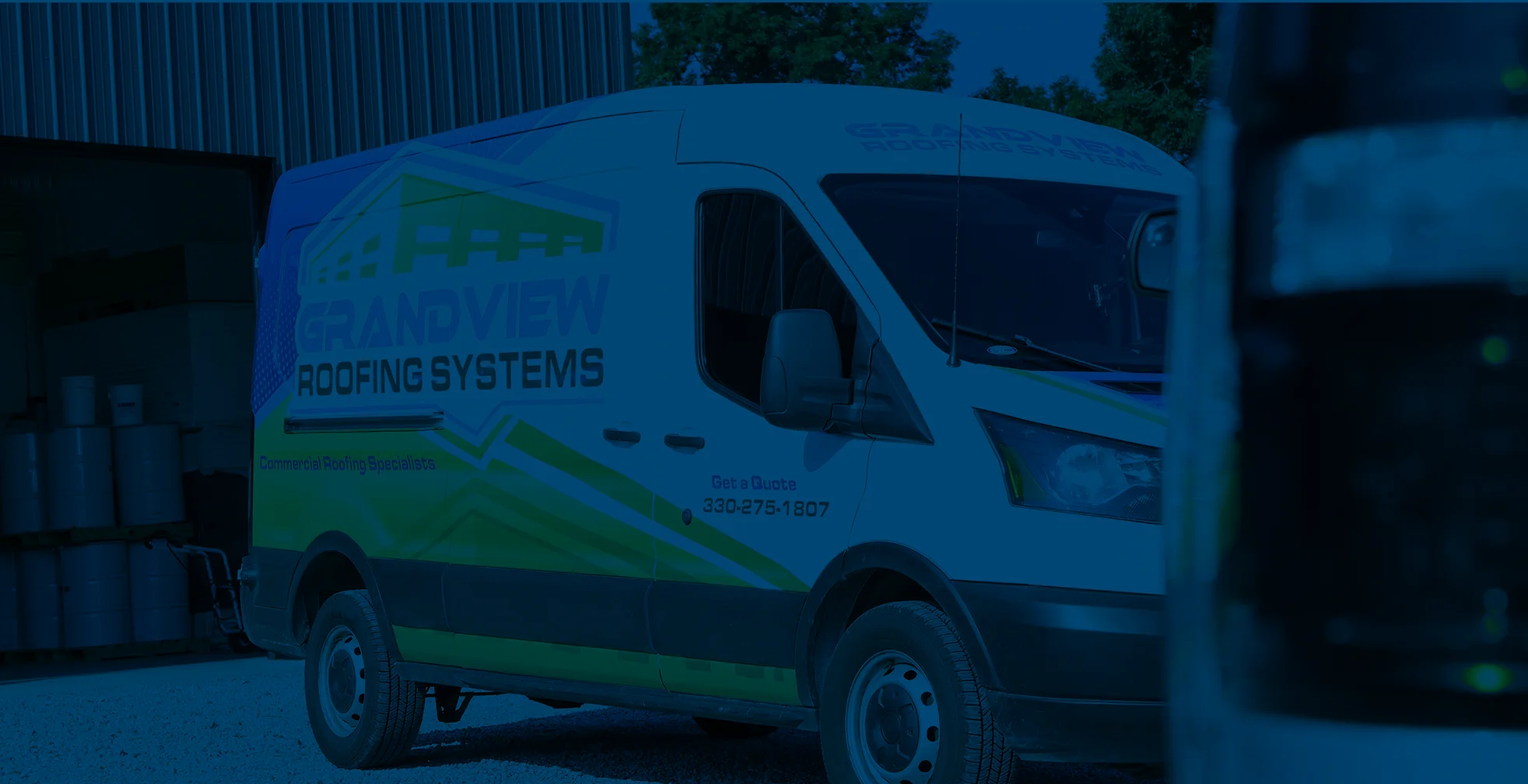 grand view branded van with blue overlay