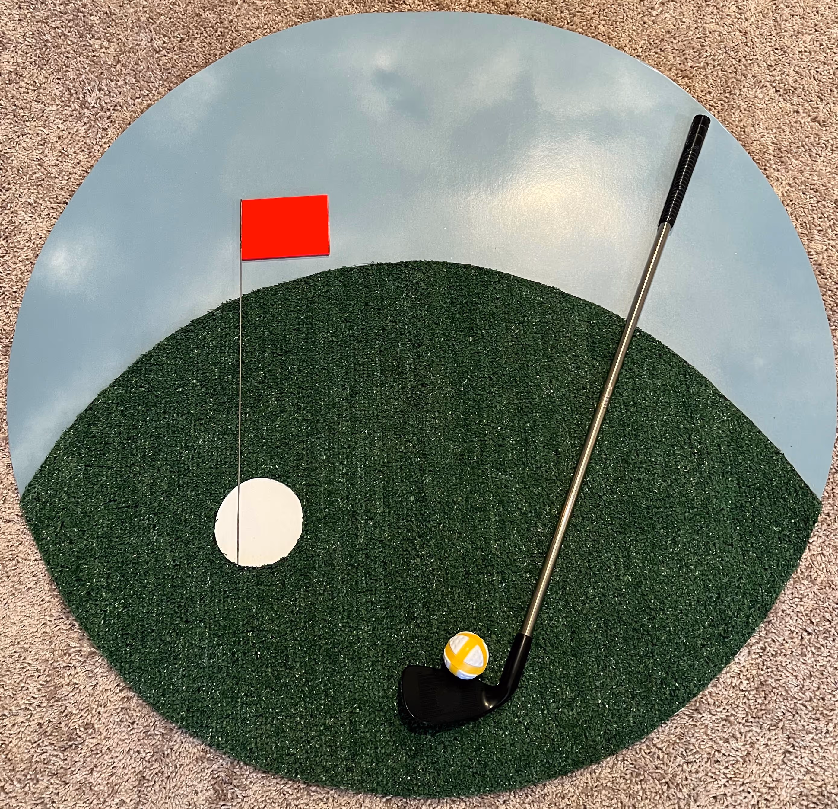 Lit letters spelling HVMS in front of silver and blue balloons at Hardin Valley Middle School with mural stars and music notes on the wall.