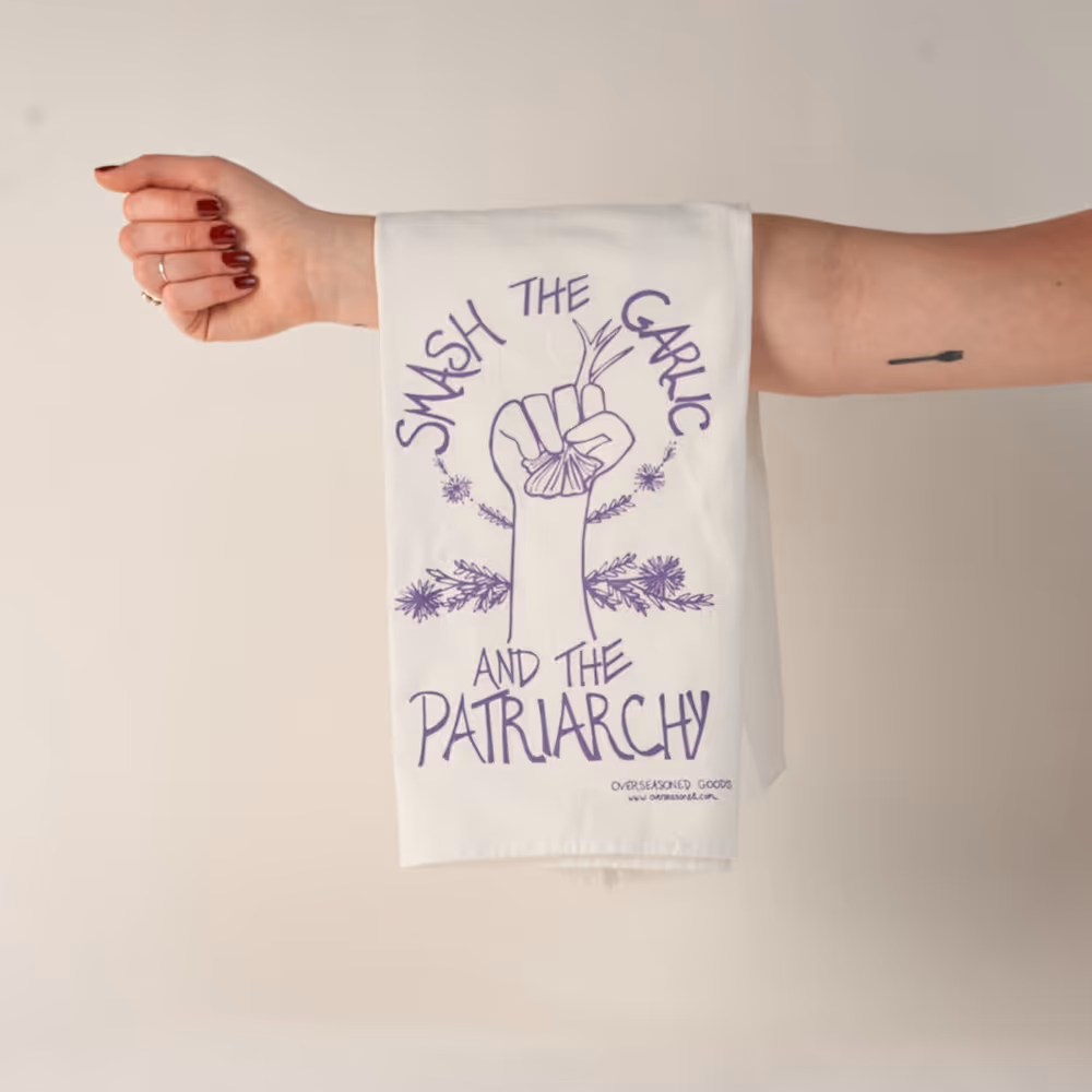 Smash the Garlic and the Patriarchy kitchen towel.
