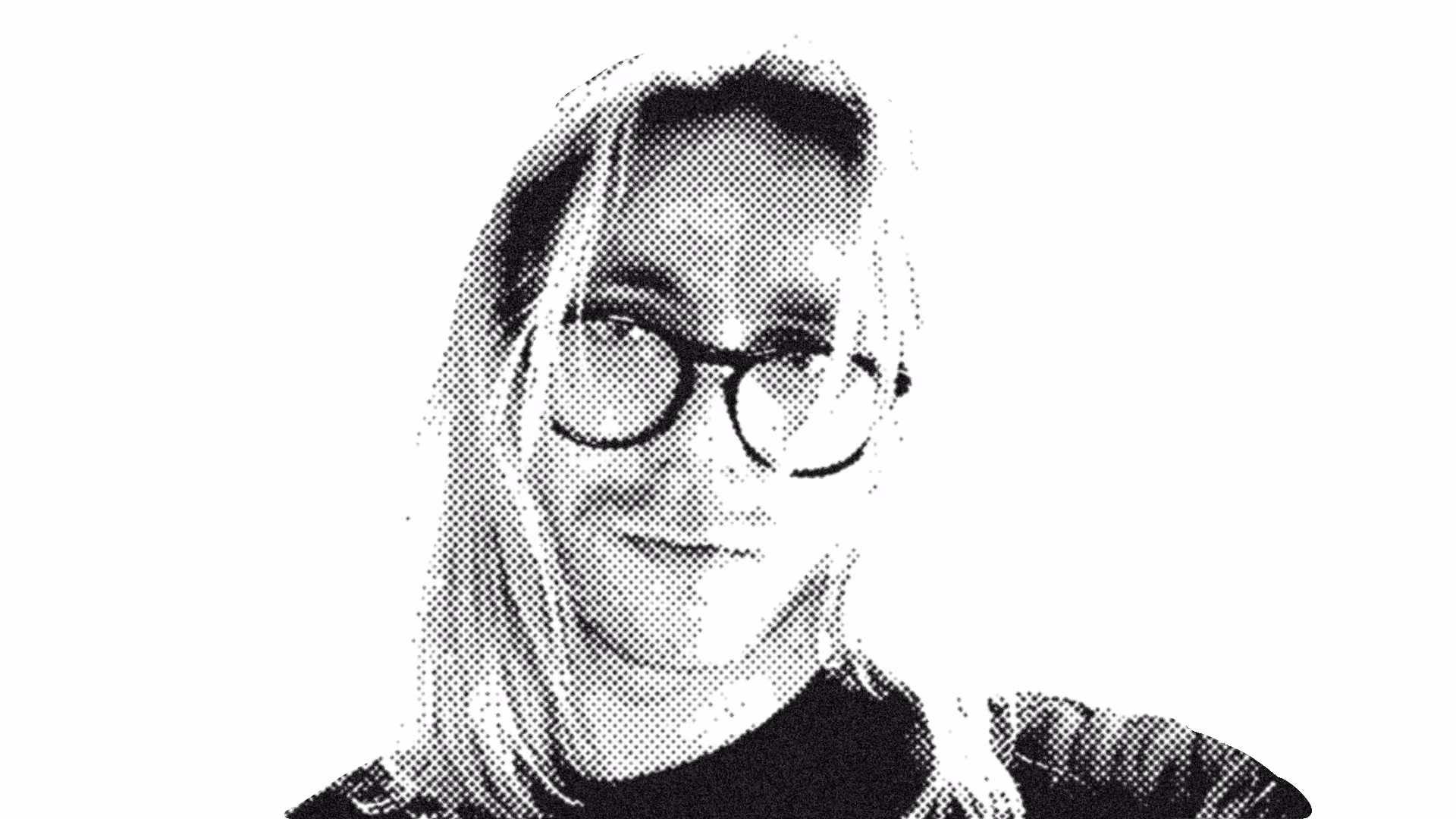 A black and white photo of a long hair man with glasses.
