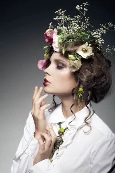 Portrait of a woman with a flower wreath in her hair