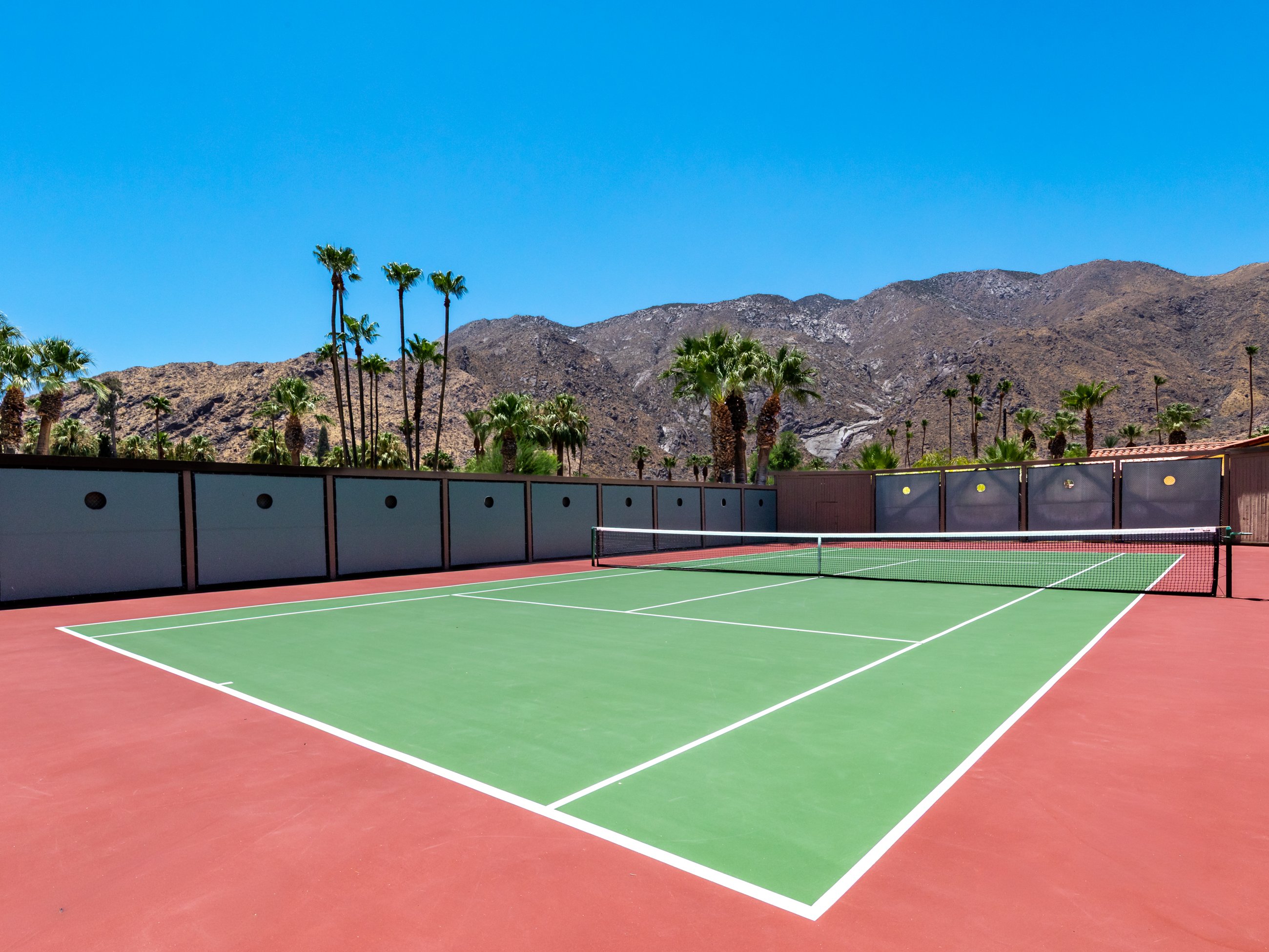 Private tennis court with mountain views