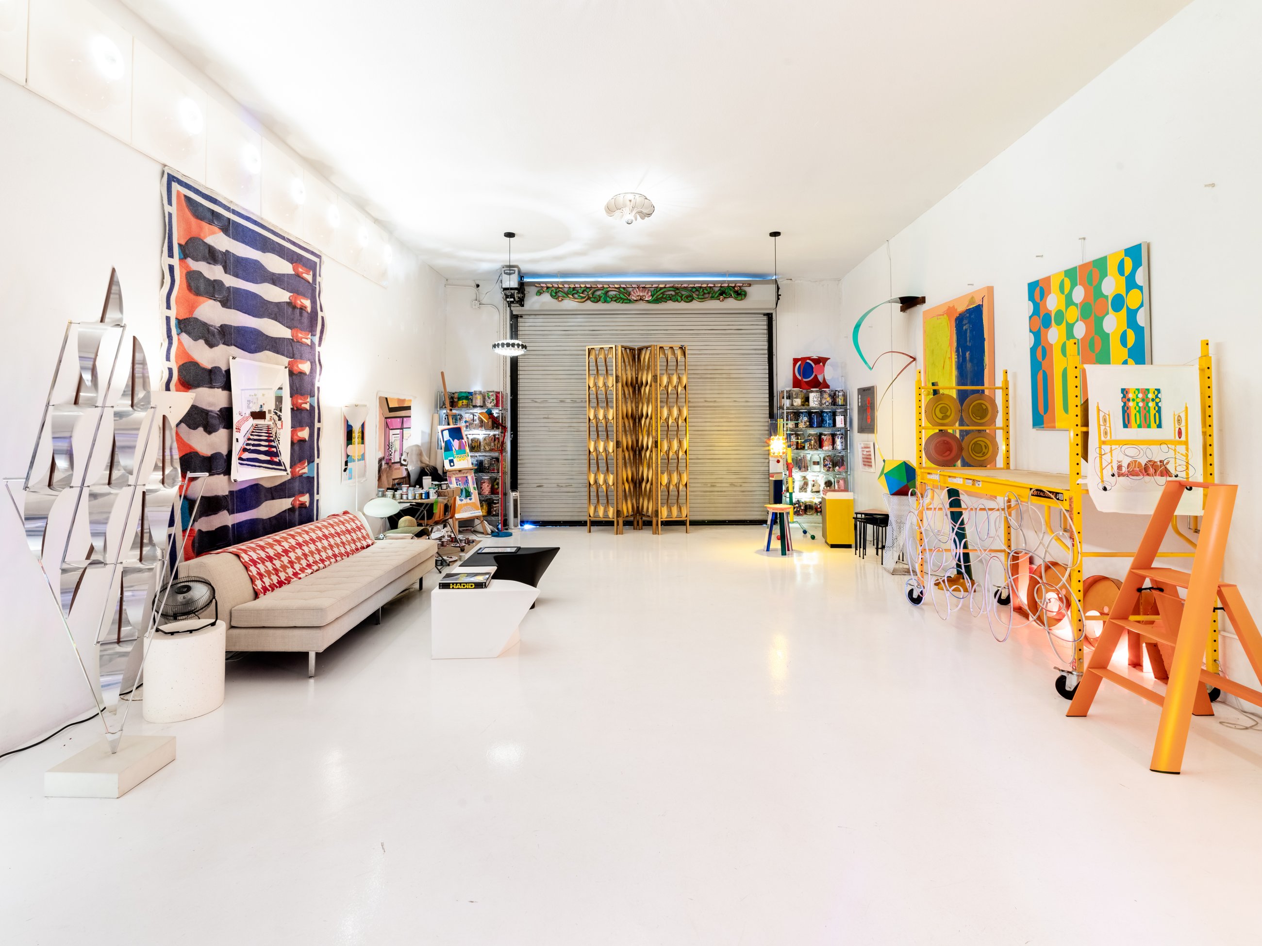 Main studio gallery with sculpture, textiles and paintings