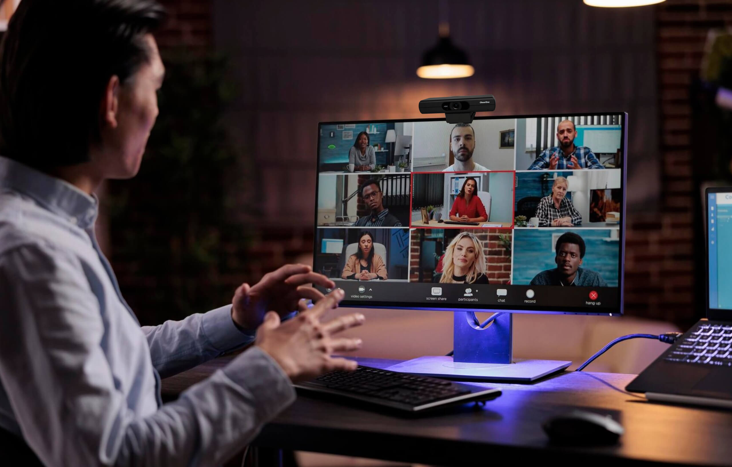 A man in a video meeting