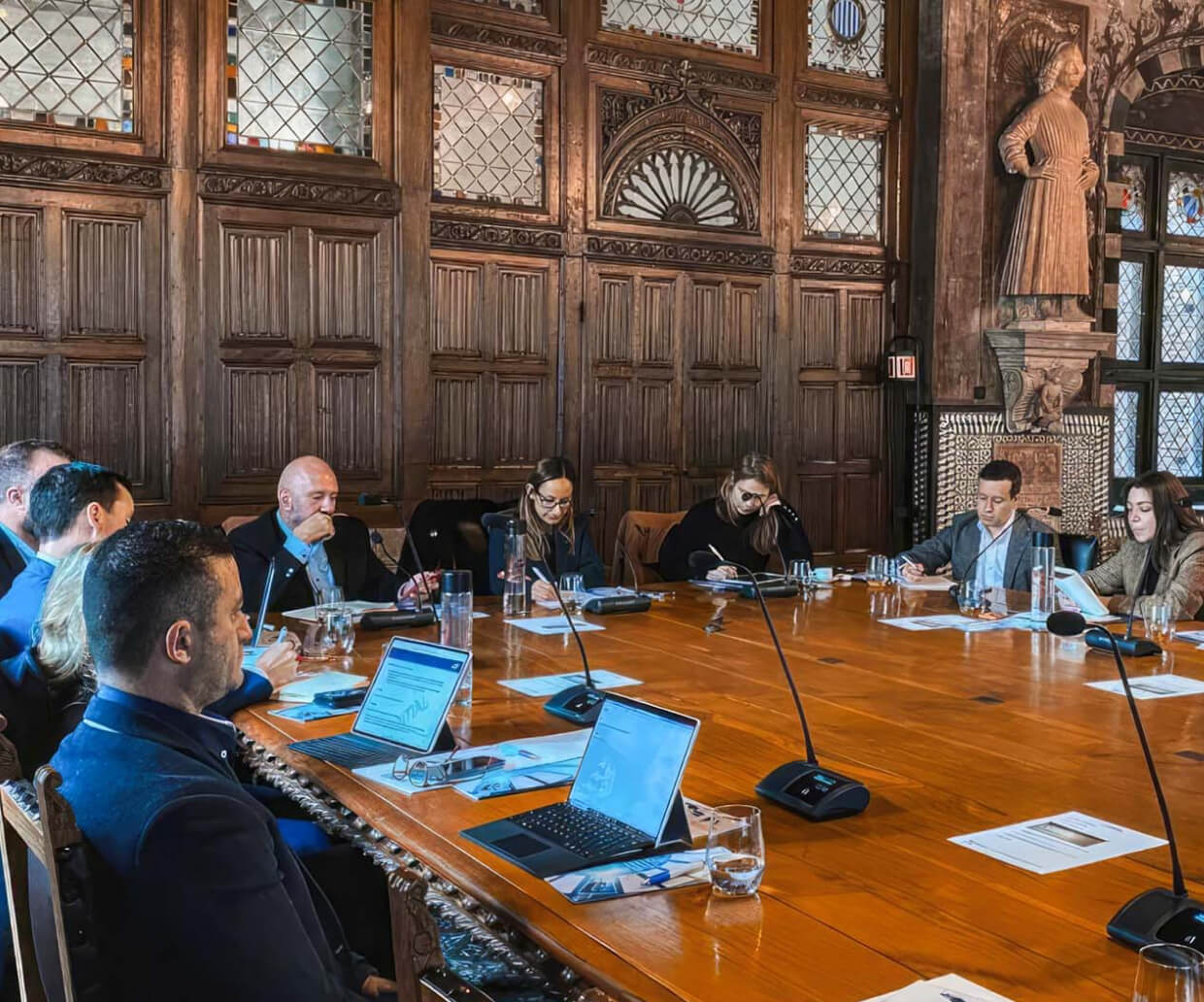 A group of people in a meeting