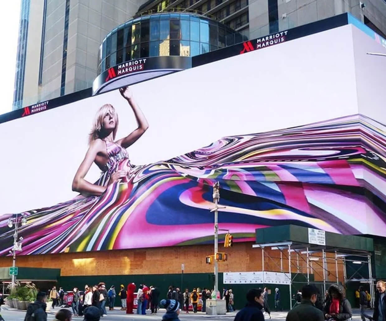 A large LED showcasing a blonde-haired woman