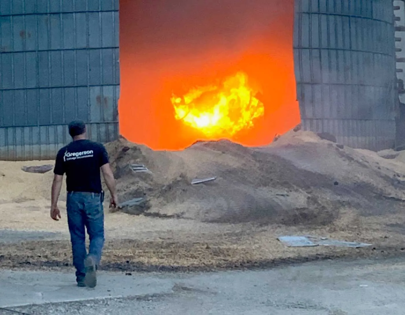 man walking toward fire core