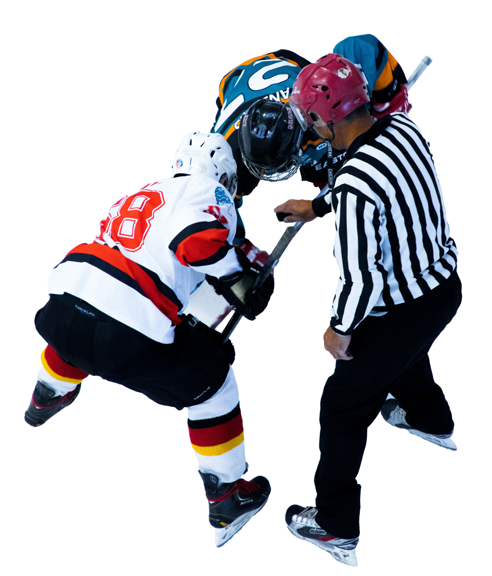 Two ice hockey players and a referee facing each other for a puck faceoff on ice.