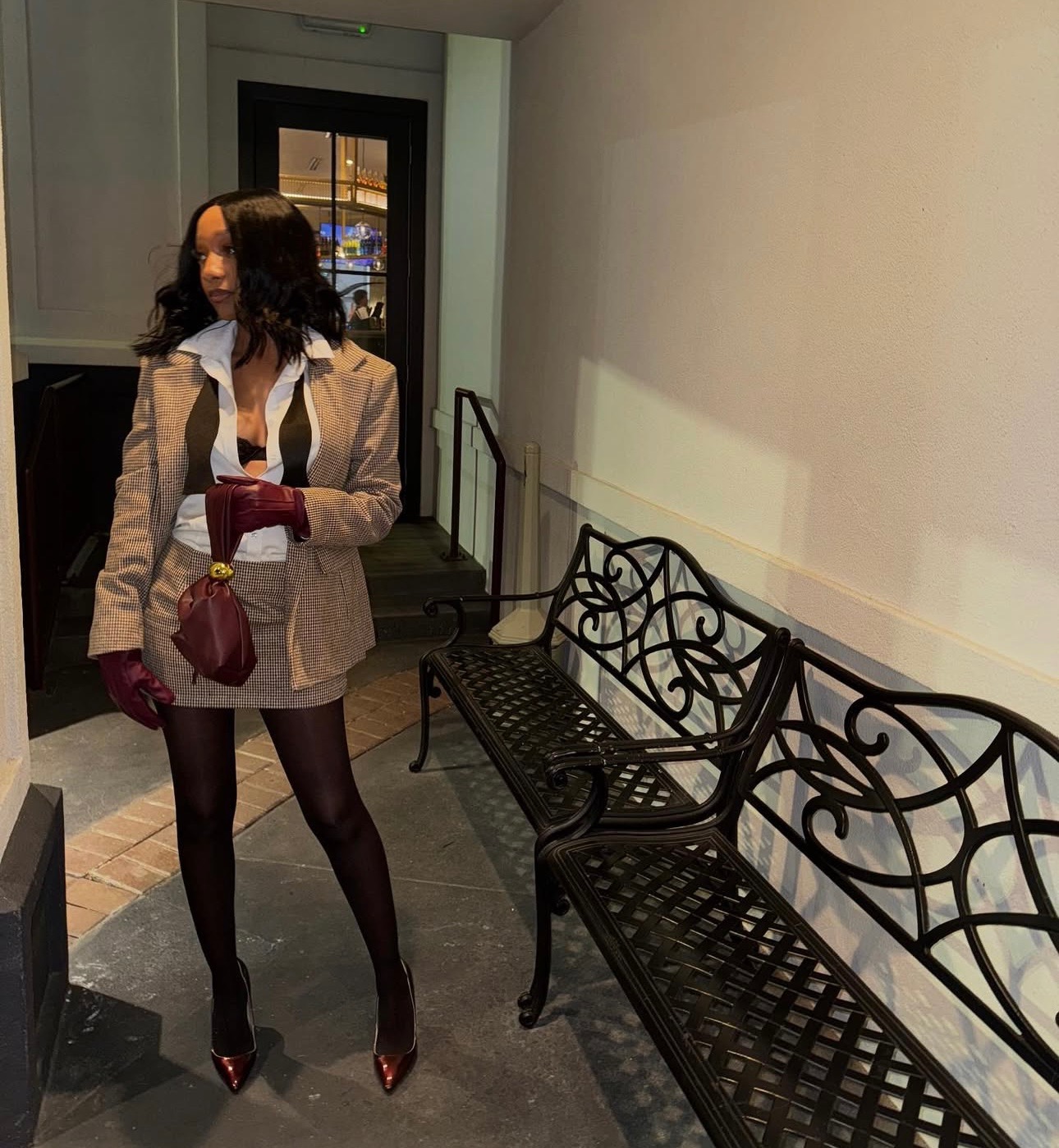 A newly wedded couple sitting on the stairs