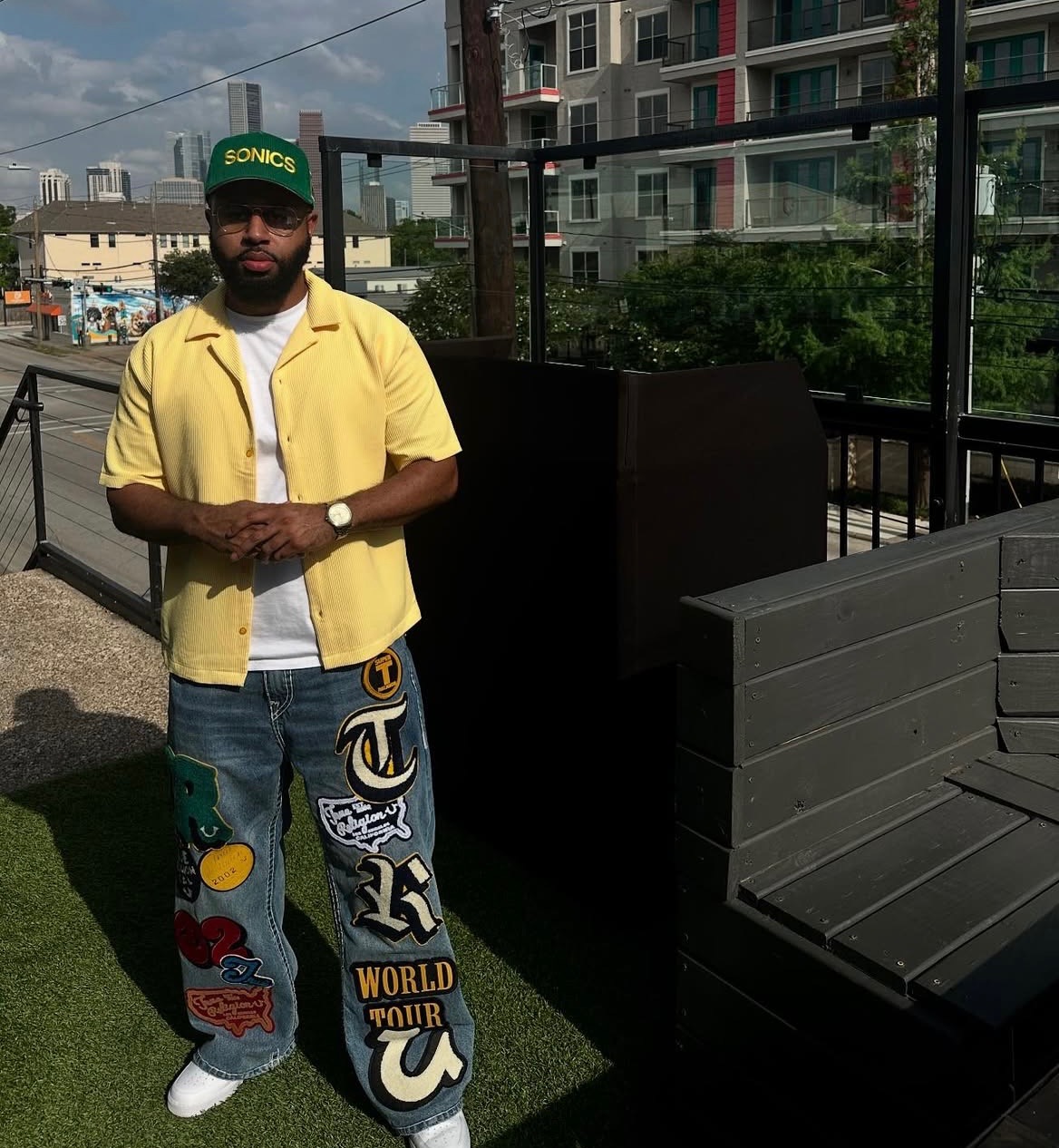 A newly wedded couple sitting on the stairs