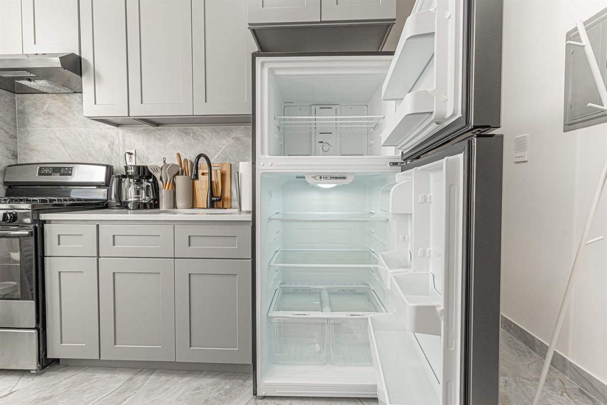Full-size refrigerator and range with all the essentials — keep groceries fresh and meals easy throughout your trip.