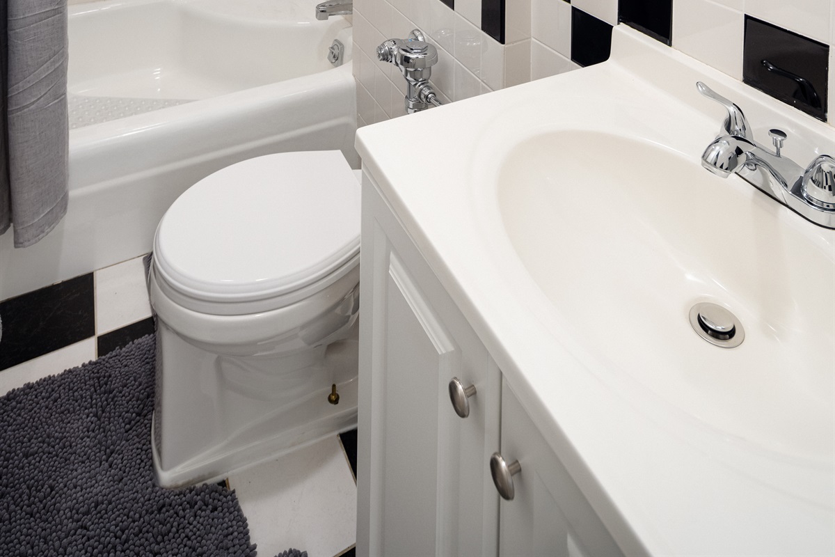 Modern bathroom with clean monochrome design.