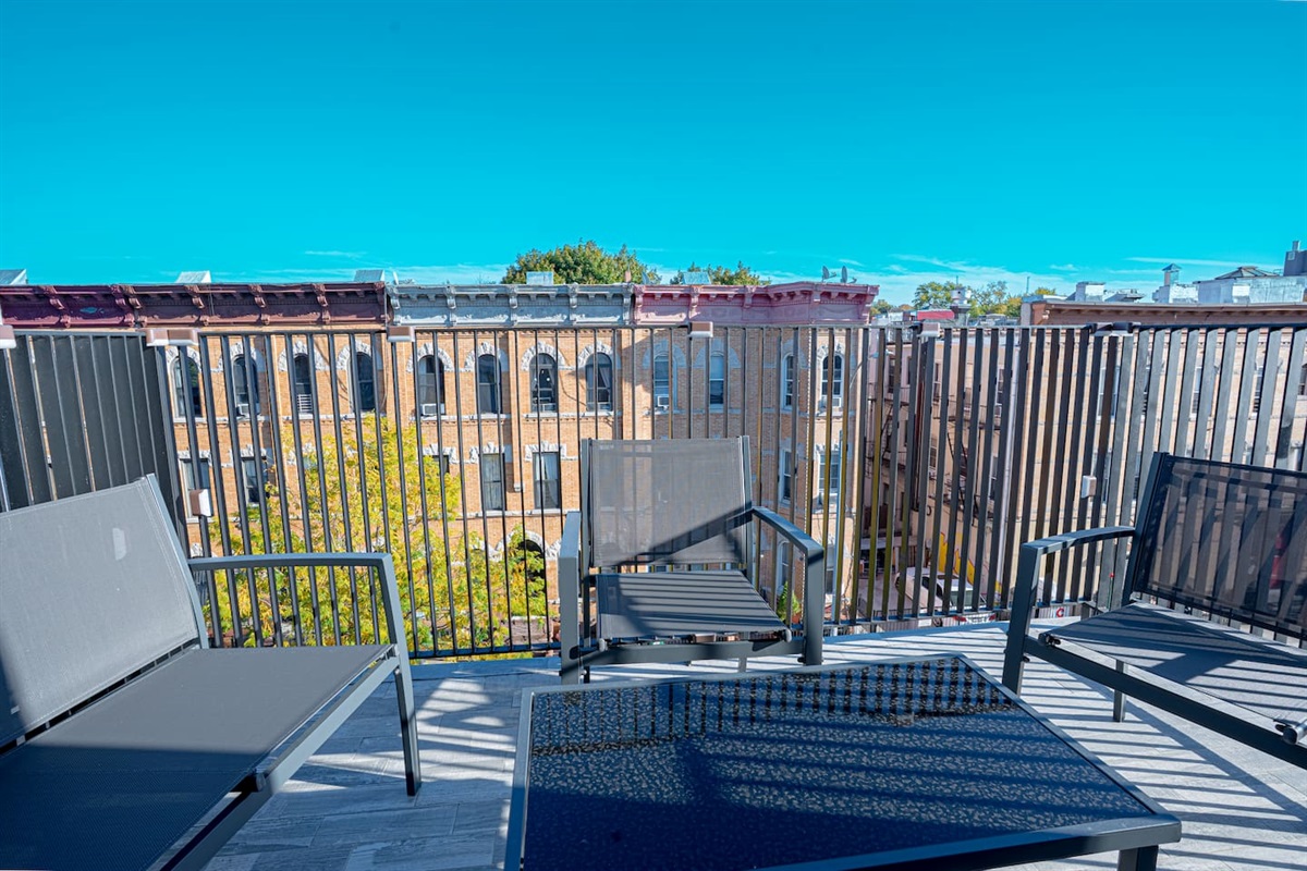 Private balcony overlooking the street—sip coffee or wine while soaking up the Bushwick vibe.