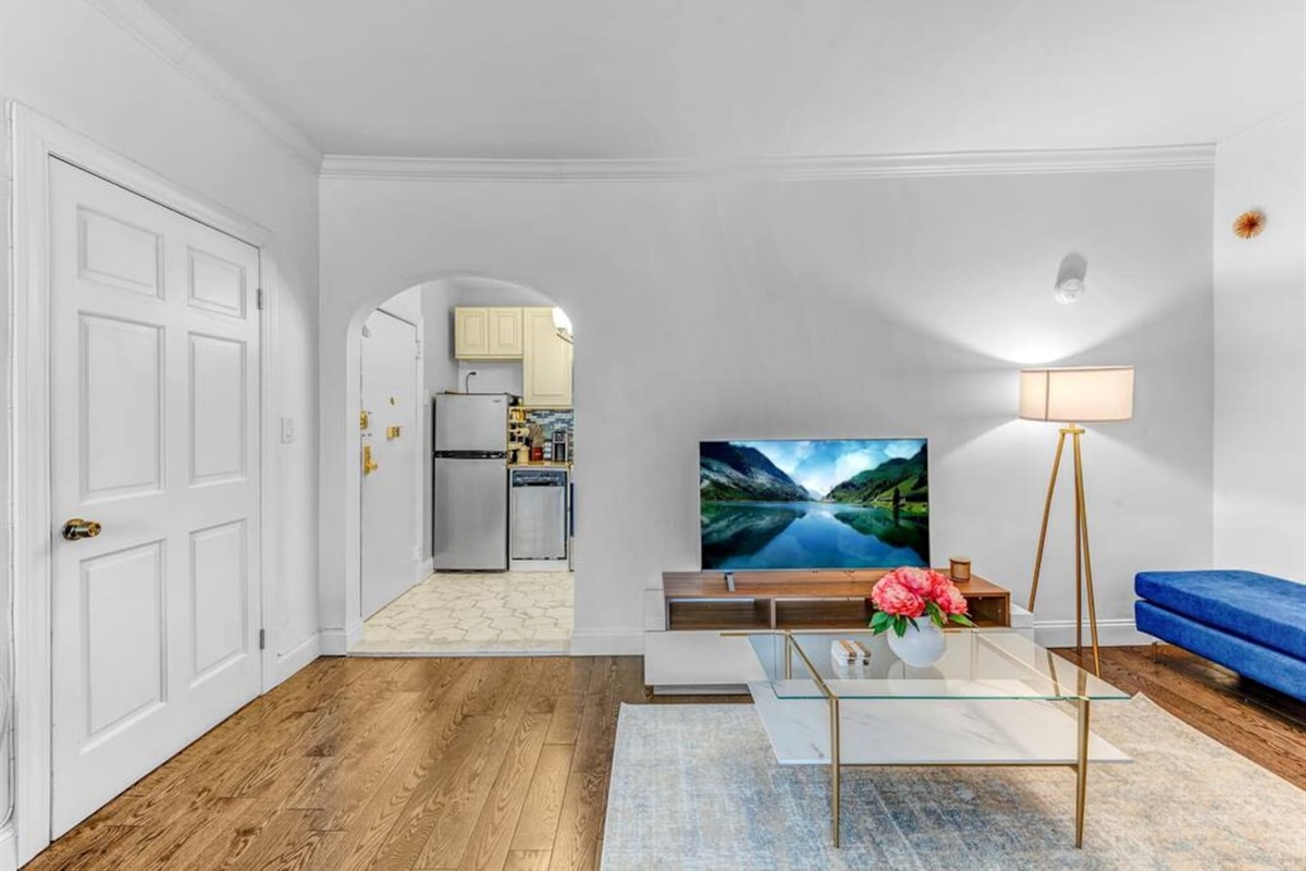 Kitchen detail with coffee maker, dishware, and all the essentials — start your morning right before crossing the bridge