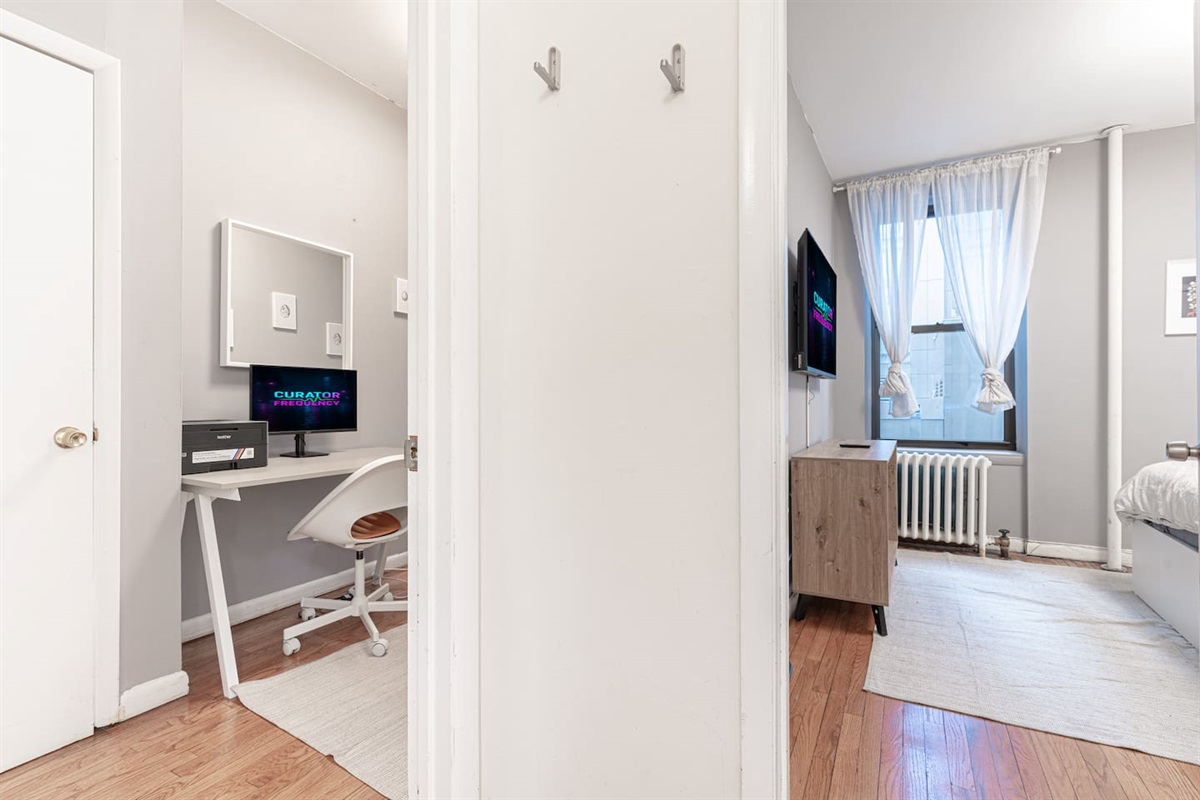 Third private bedroom with queen bed — comfortably sleeps up to 6 guests across 3 bedrooms.