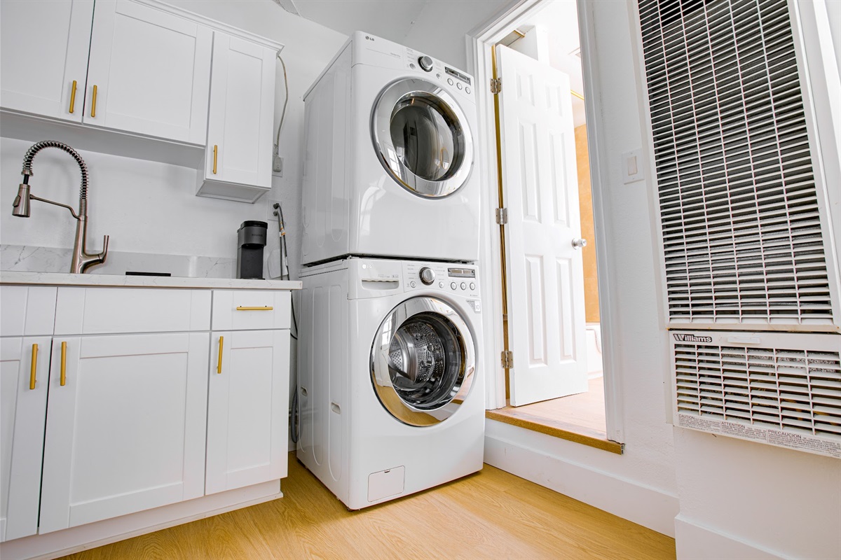 In-unit stacked washer and dryer — the convenience of laundry right at home.
