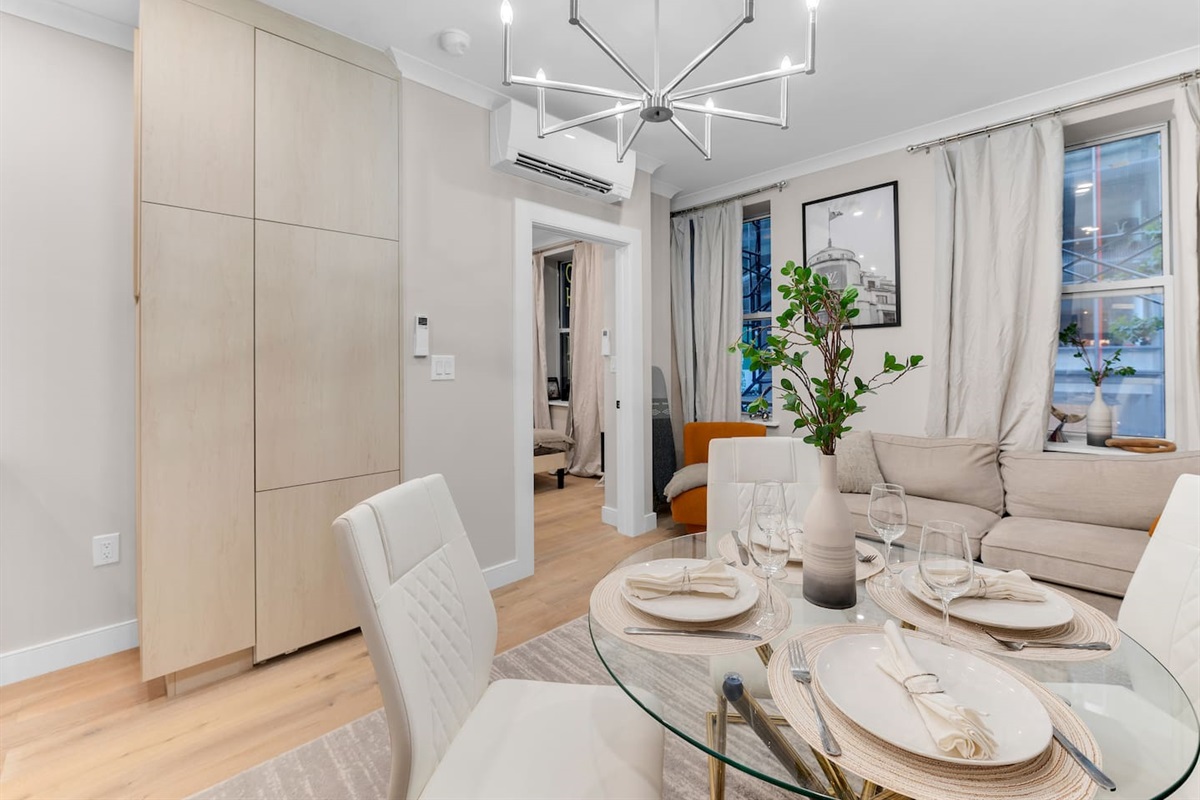 Second bedroom with queen bed — comfortable accommodations for up to 7 guests across 3 bedrooms.