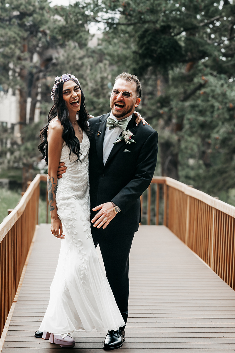 A candid snap of a lovely wedding couple in laughter during a posing with Shutterpix Photography.