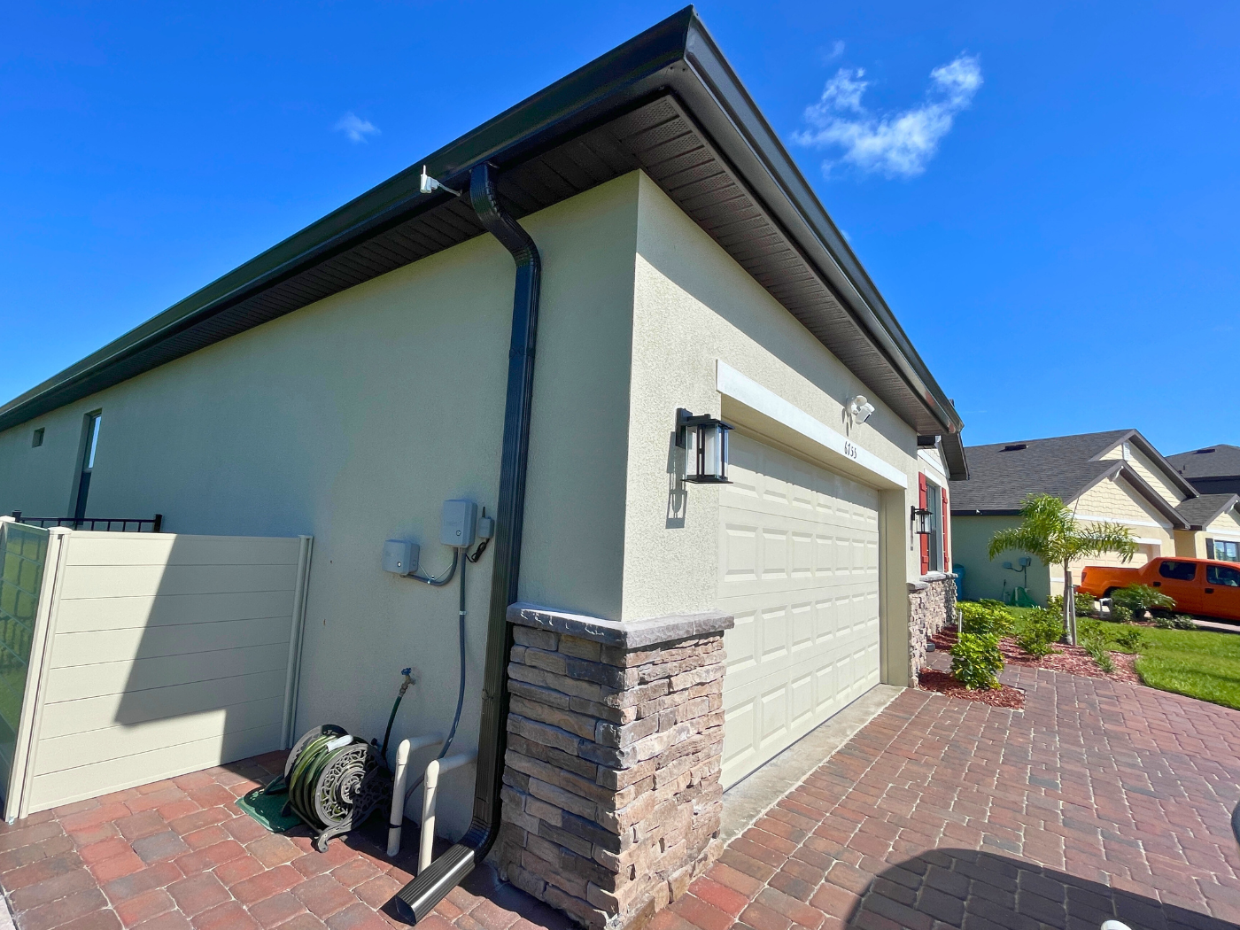 A house with dark gutters