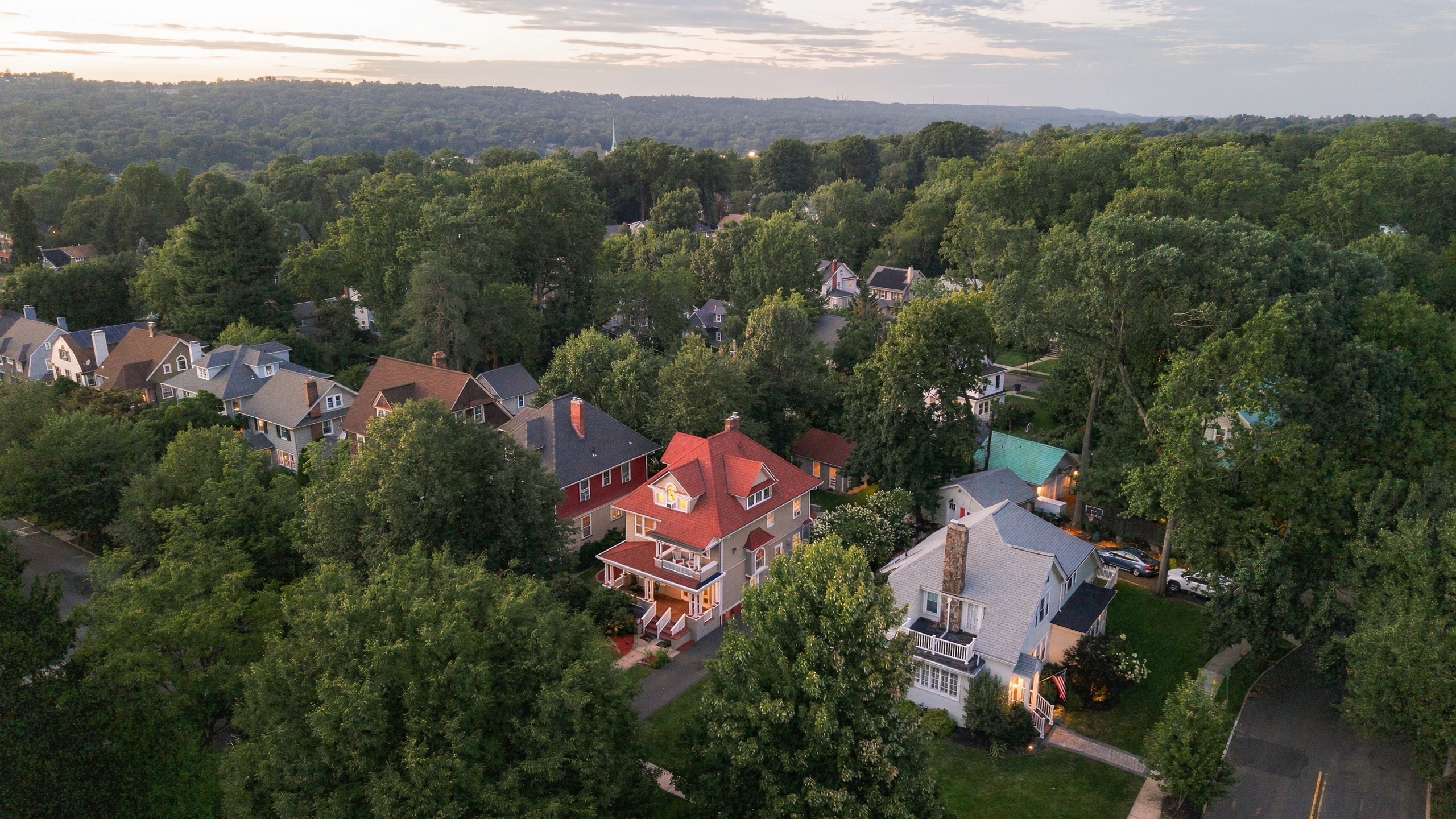South Orange Colonial — aerial at dusk