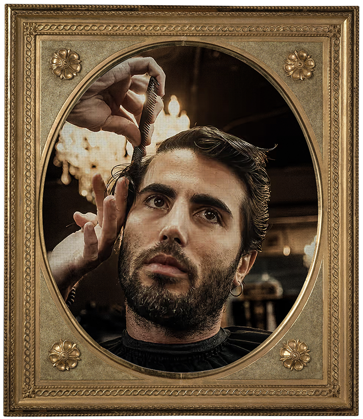 Man receiving a classic haircut, with a barber combing his wet hair in a stylish barbershop.