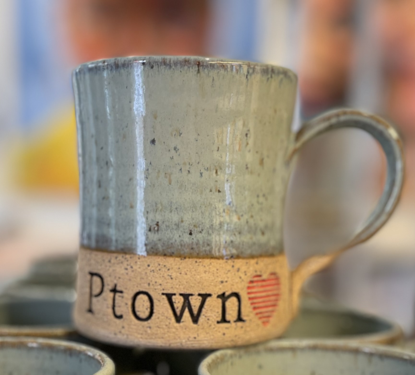 Blue handmade pottery mug with Ptown and a read heart