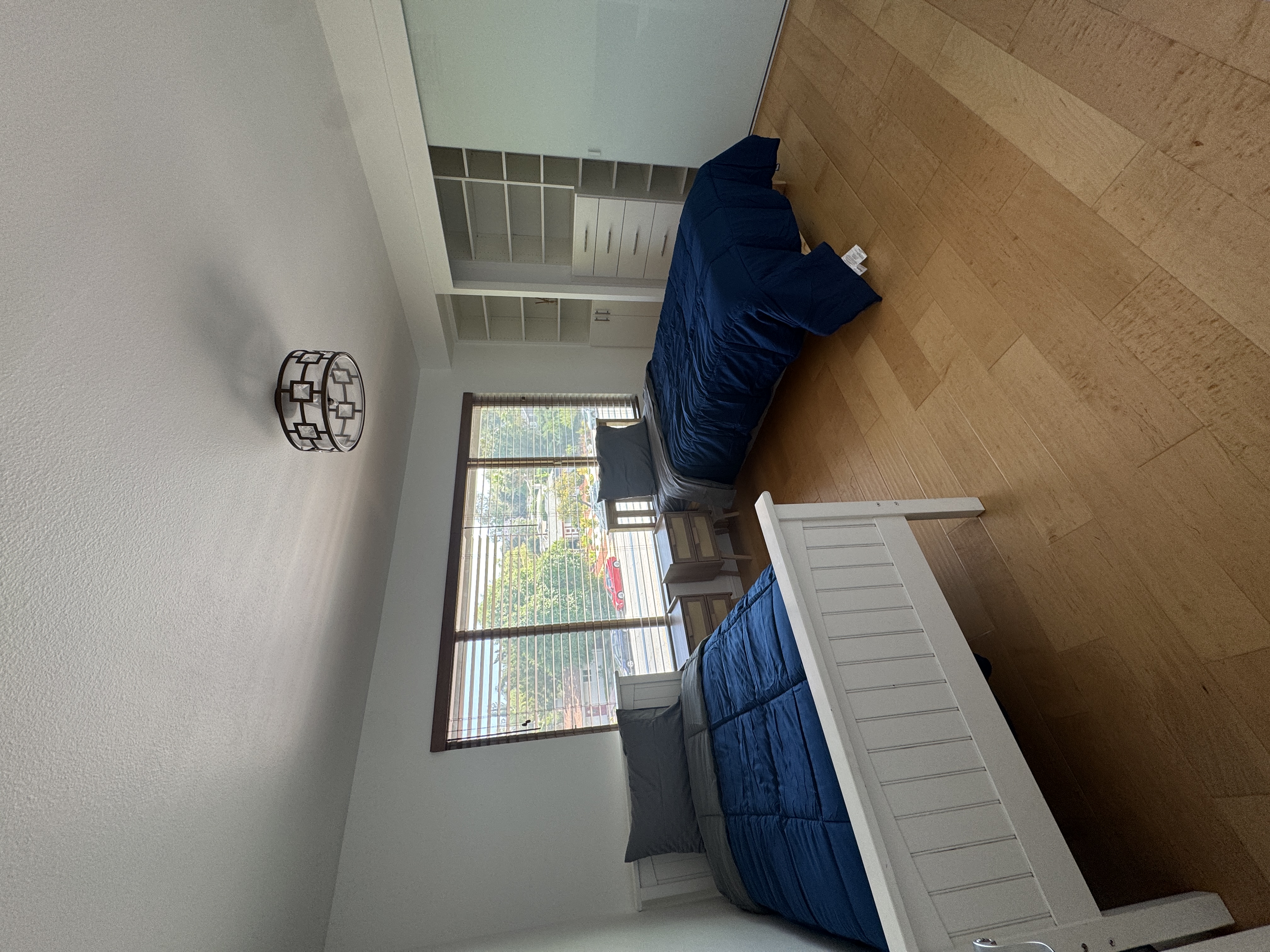 interior of a bathroom with a toilet and windows