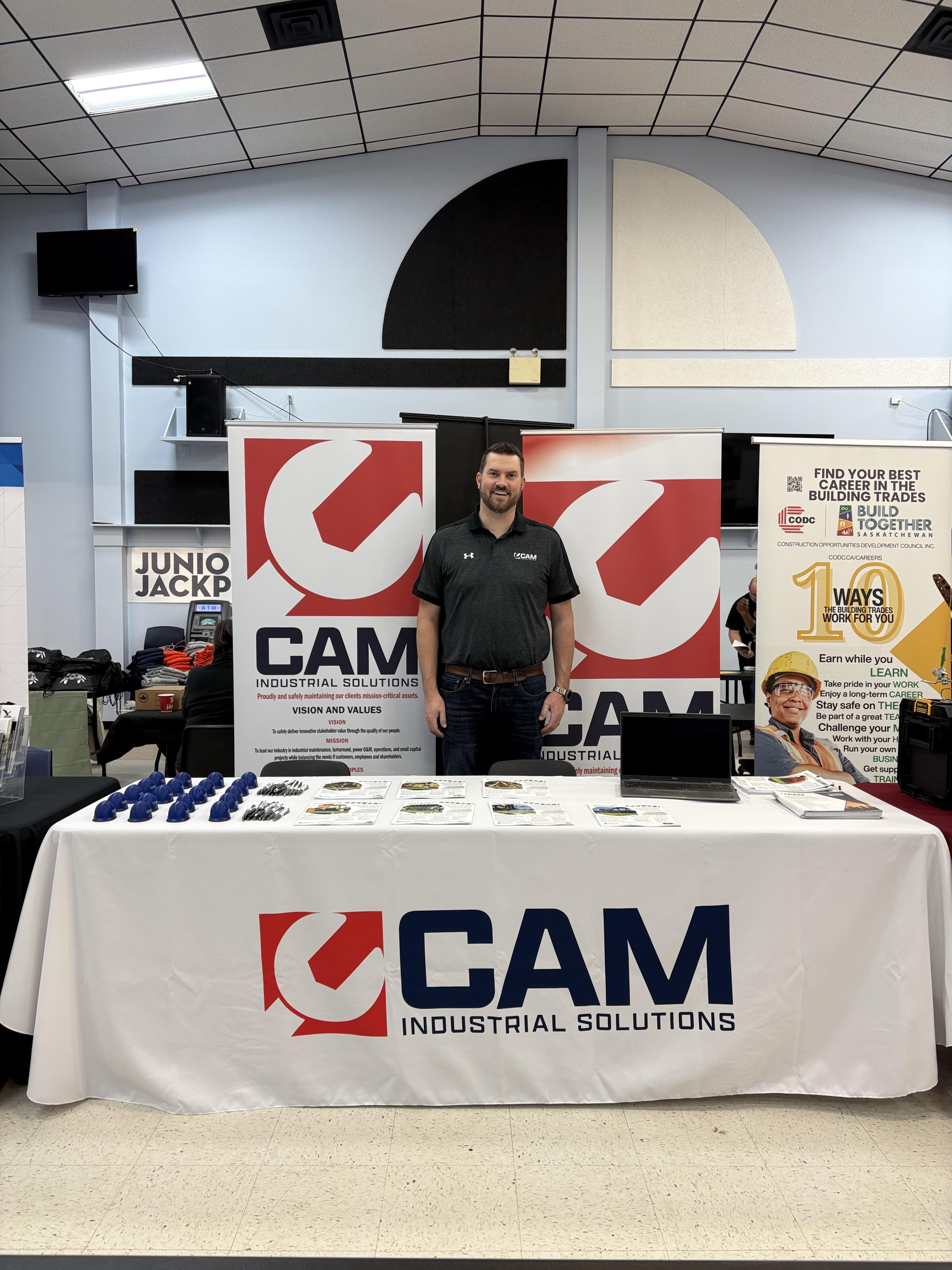 Dustin Mayes at the CAM Industrial Solutions booth during the George Gordon First Nation Career Fair
