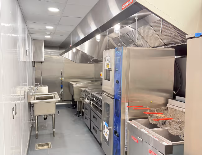 A view from the inside of a fully equipped container kitchen