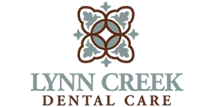 Lynn Creek Dental Care logo featuring an abstract floral design above the text.