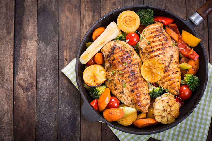 Chicken and veggie dish in skillet