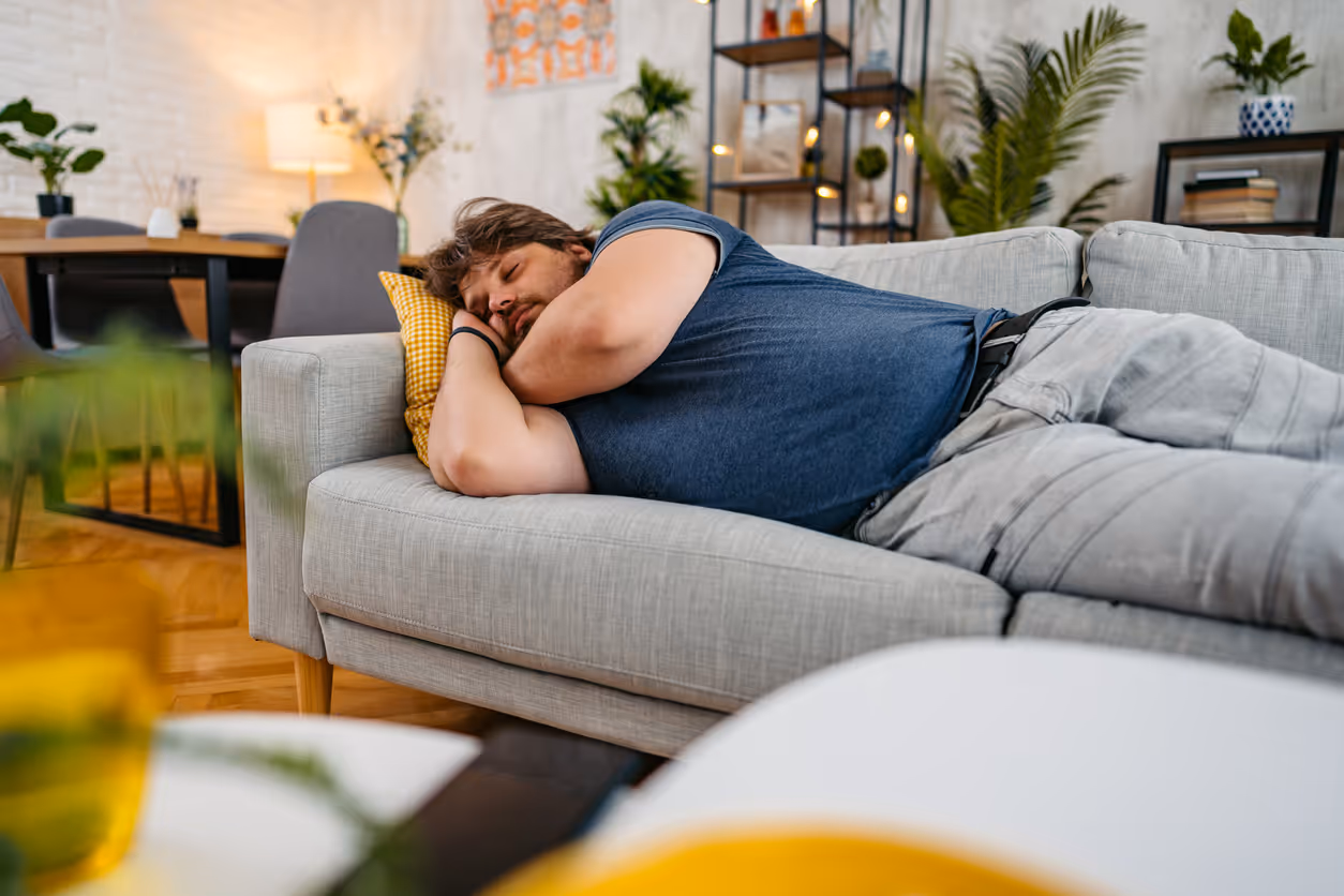 Man sleeping on couch