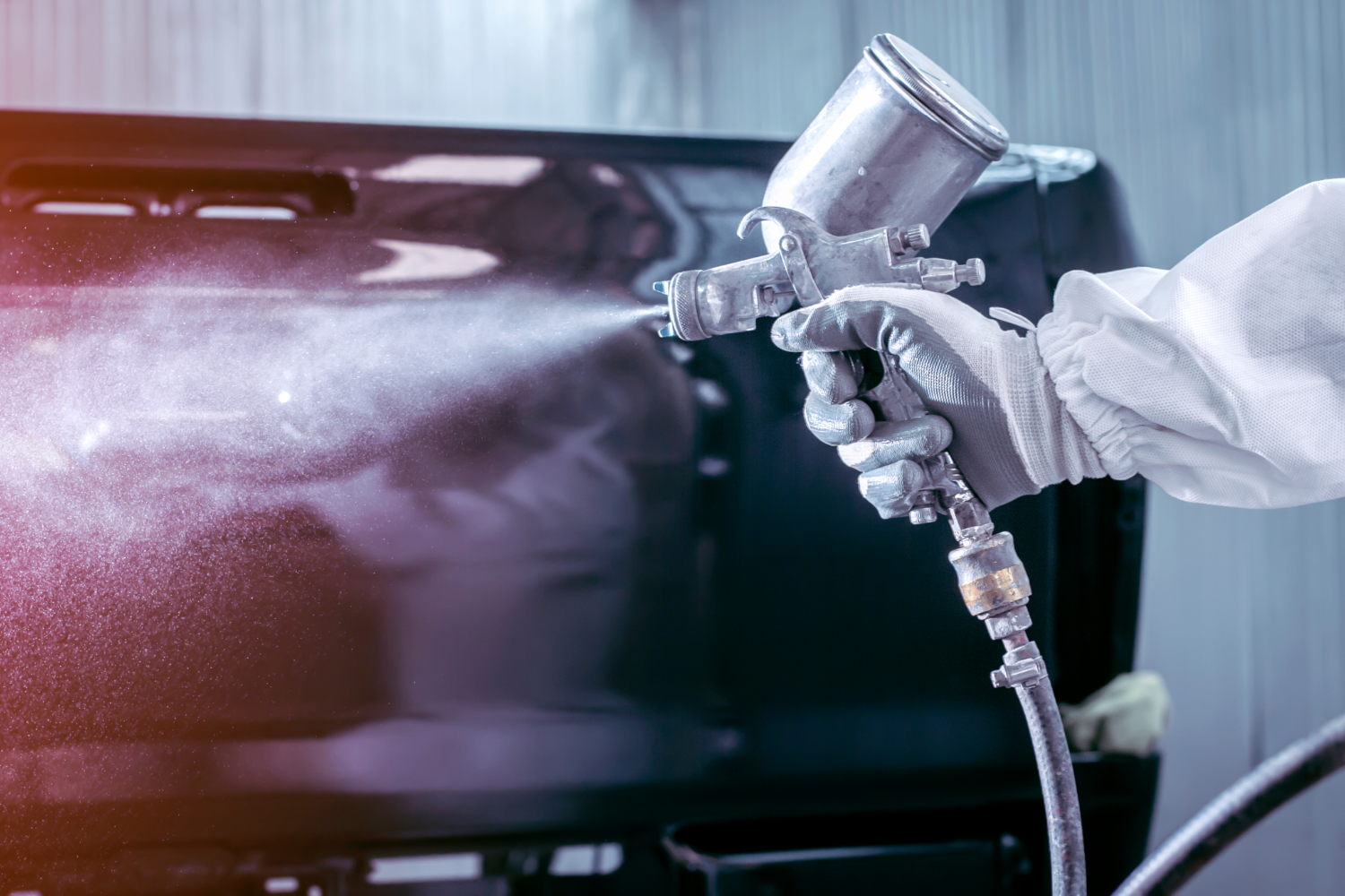 Auto body paint spraying.