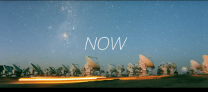 Photo of a field of satellite dishes with the text "Now" overlaying it