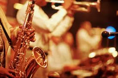 Photo of two people playing trumpets