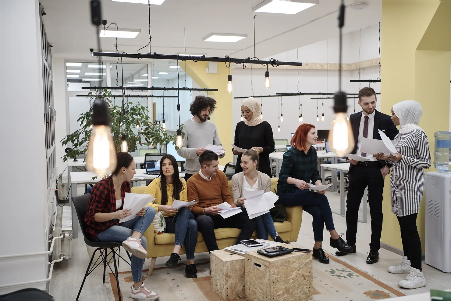 Photo of employees discussing