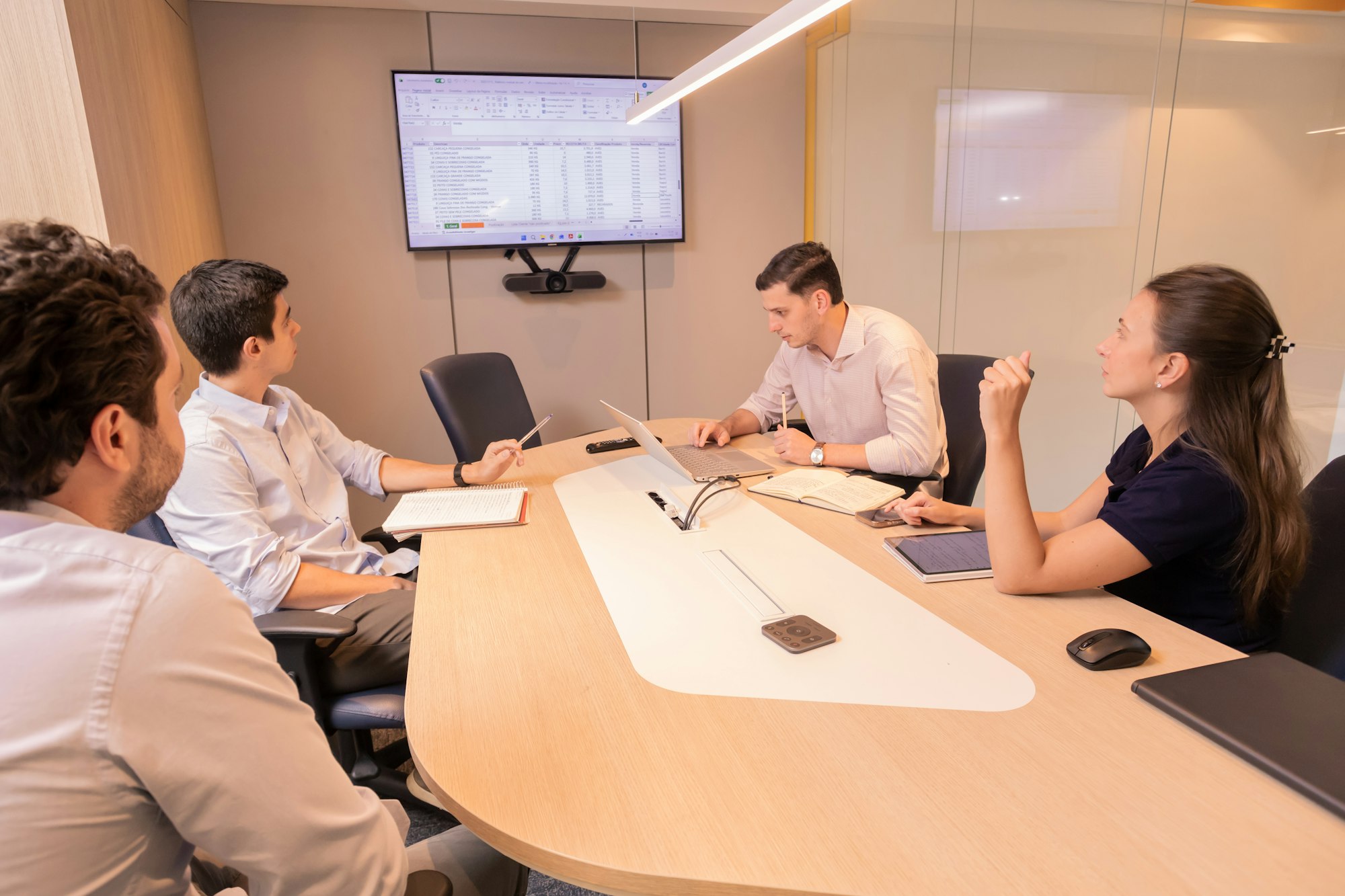An executive mapping out an organizational chart, representing an authority structure for AI agent governance