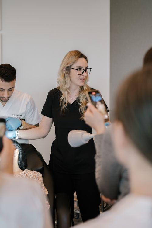 Dr. Cheryl Haseeb speaking to a class of trainees