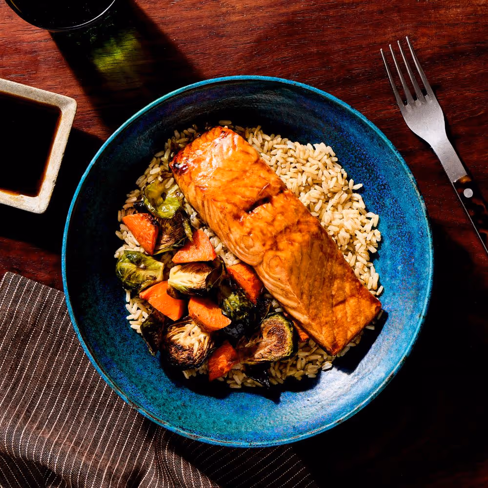Chef-prepared salmon meal with vegetables designed as part of a food as medicine approach with dietitian oversight