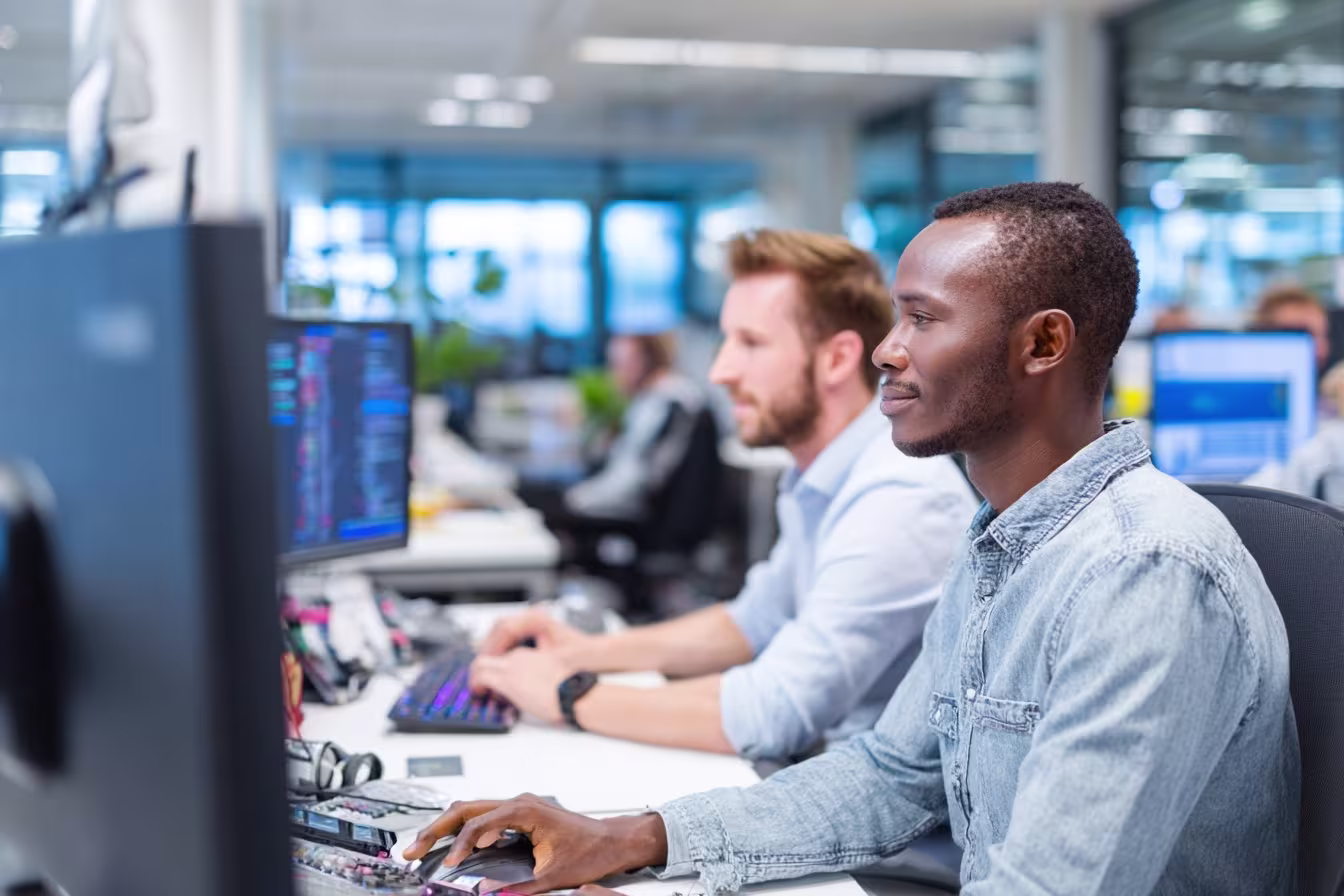 Professionals in modern IT asset management office