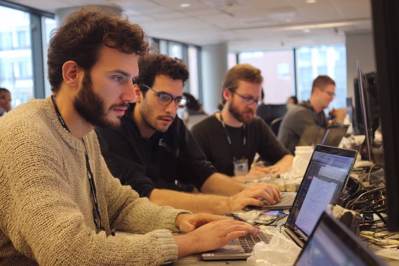 Cybersecurity team collaborating on anti-phishing protocols