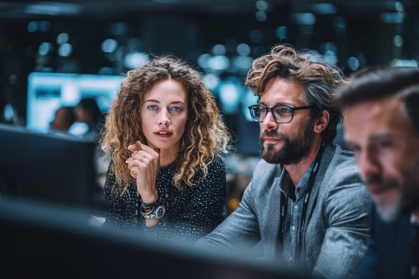 Cybersecurity experts discussing cyber insurance guide