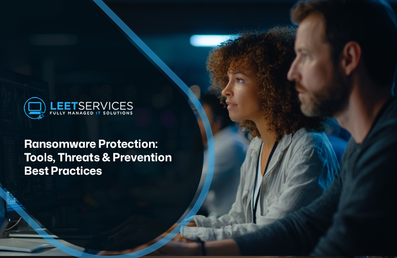 IT professionals reviewing cybersecurity screens with Leet Services ransomware protection tools threats and prevention bes...